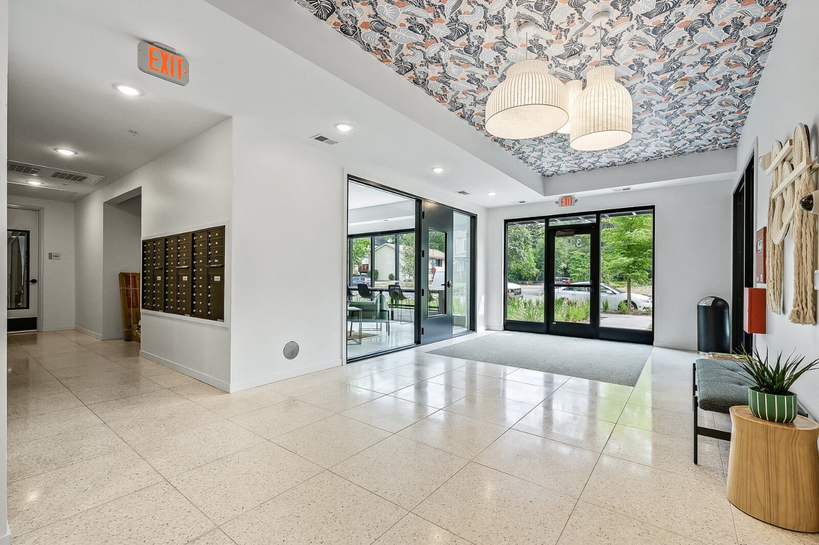 the building lobby with the mail boxes and access to the lounging area