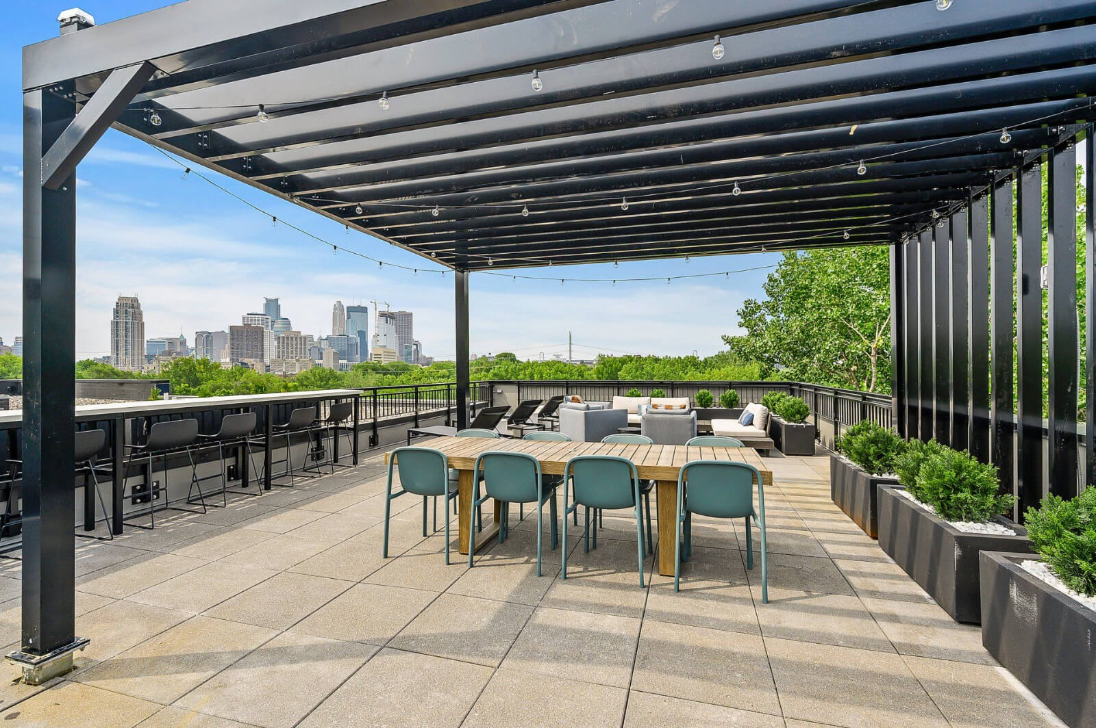 a seating area for eating and socializing on the community balcony