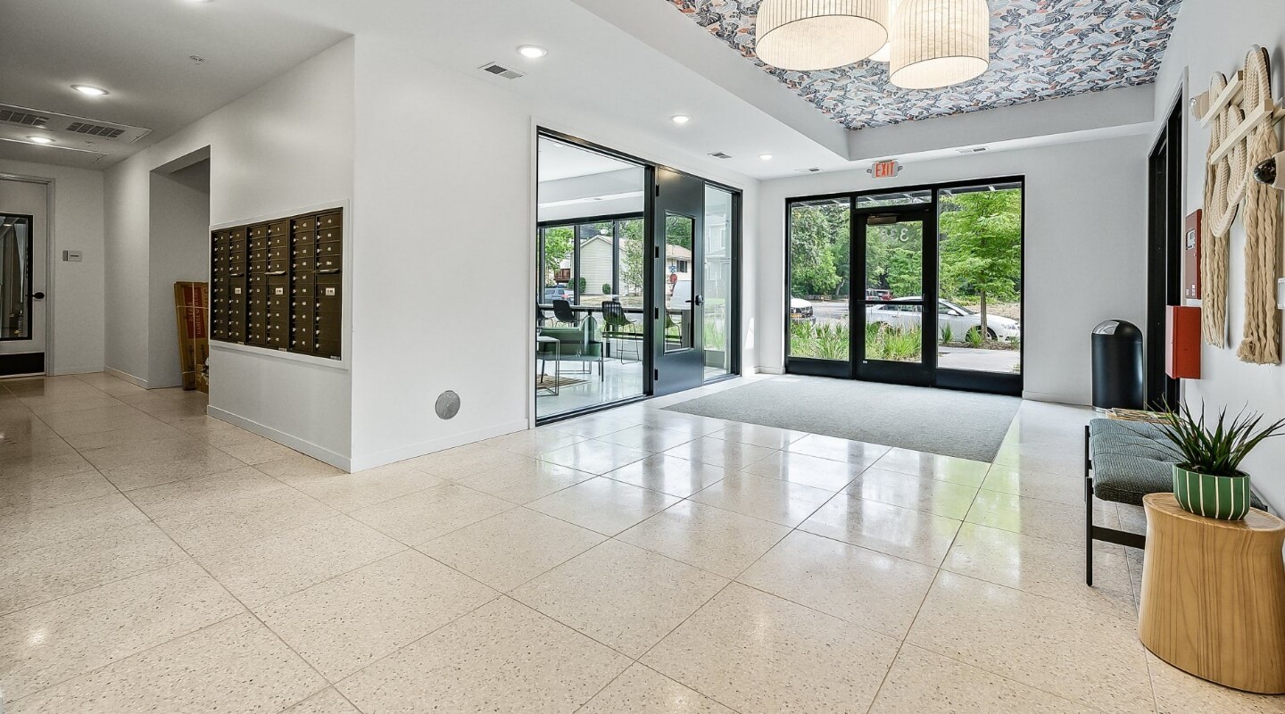 the apartment building lobby looking at the front door