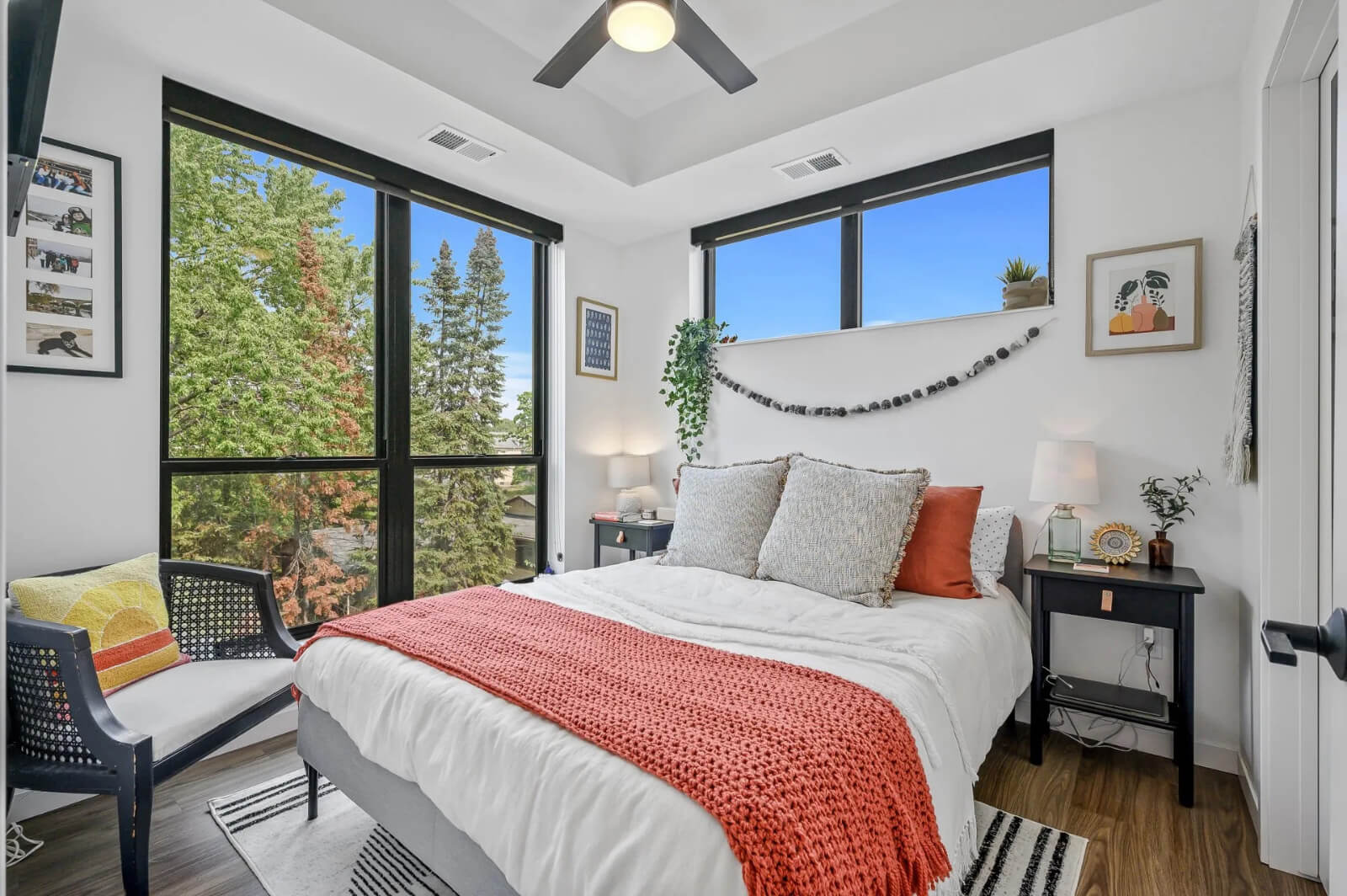 an apartment bedroom fully decorated