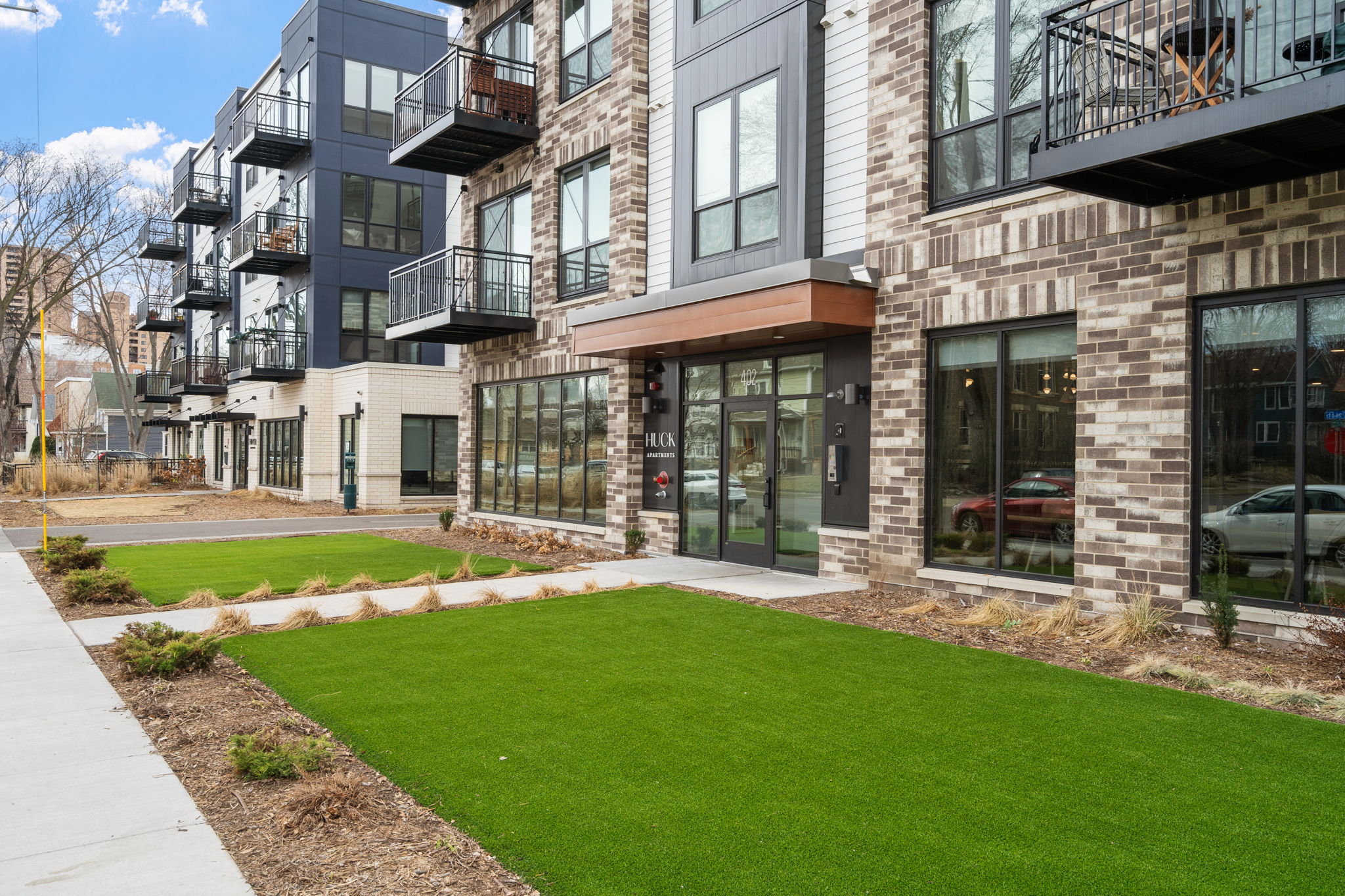 the front of the huck apartment building