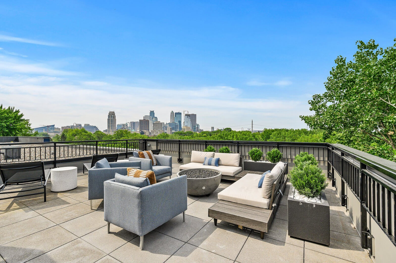 the community balcony with seating and a firepit